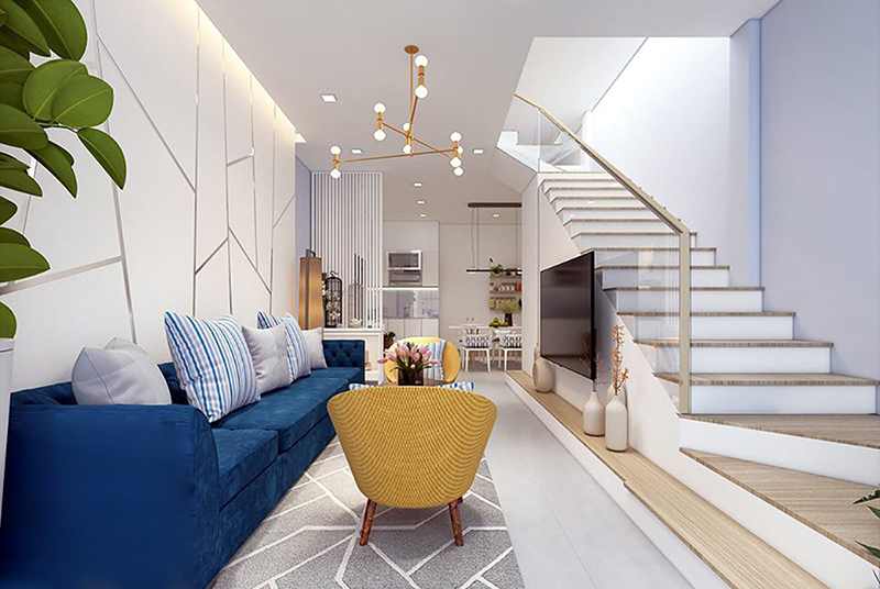 Mẫu 18: Phòng khách trong mẫu thiết kế này sử dụng màu trắng làm chủ đạo và được làm nổi bật bởi ghế sofa màu xanh dương đậm